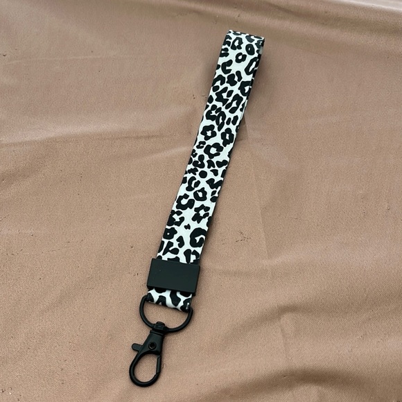 Accessories - 3/&10 NEW keychain hand strap black white cow print